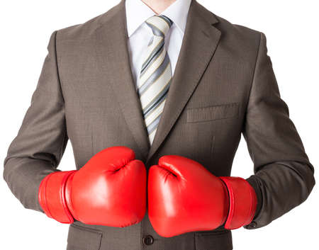Businessman in boxing gloves isolated on white backgroundの写真素材