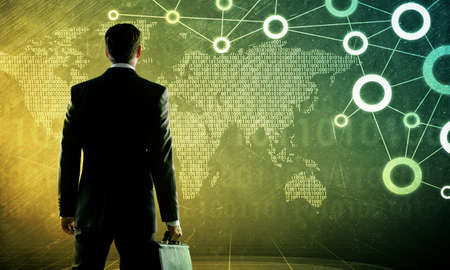 Businessman in suit against digital background with icons and numbers