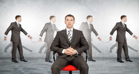 Handcuffs, white collar crime, arrest. Business boss on chairの写真素材
