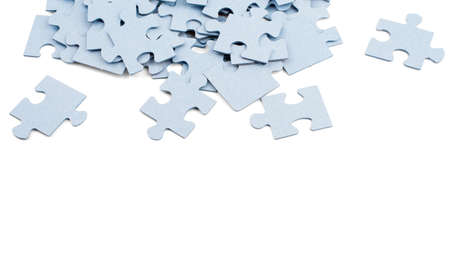 Puzzle pieces isolated on white background, closeup