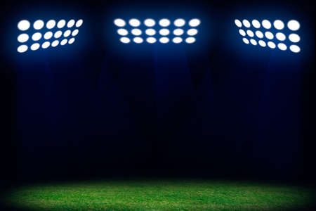 Three spotlights on soccer field. Sport abstract background with copy space