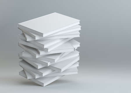 Stack of white empty books on gray backgroundの写真素材