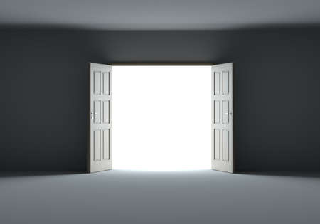 Doors opening to show bright light in the darknessの写真素材