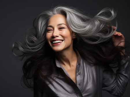 Woman with long, thick gray hairの素材