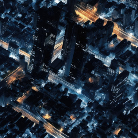 Top view of the city at night with illuminated streetsの素材