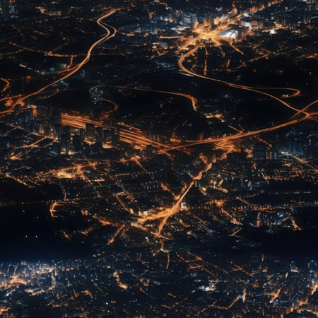 Top view of the city at night with illuminated streetsの素材