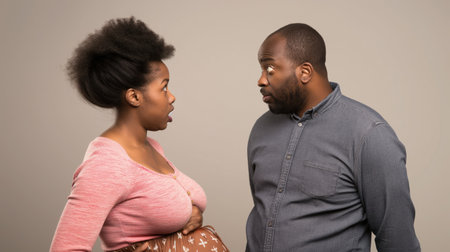 Pregnant woman staring at her husband with bulging eyesの素材