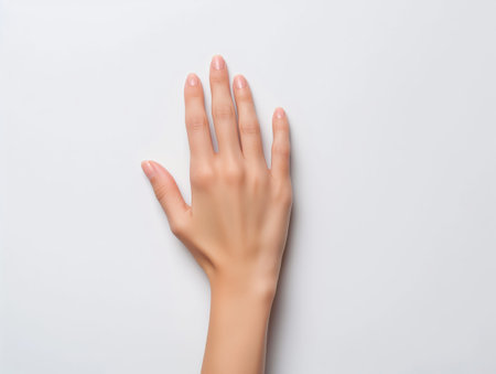 Hand of woman on white backgroundの素材