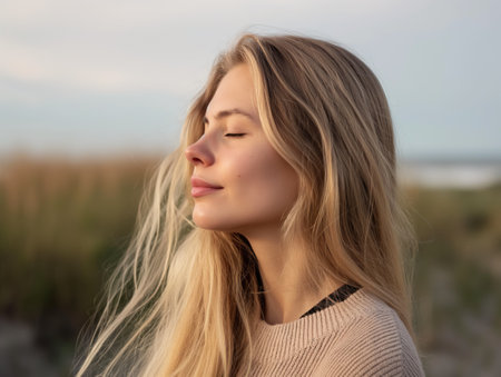 Young beautiful woman with long blonde hairの素材