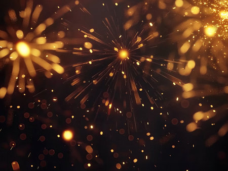 Gold particle background with bright flashesの素材