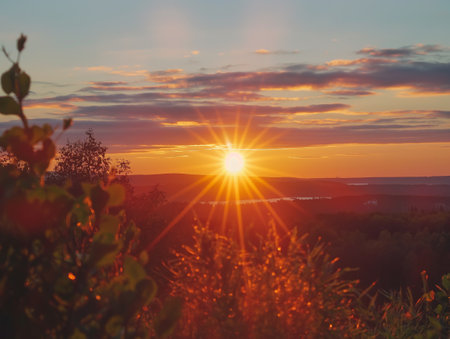 A breathtaking sunrise sky time lapse, capturing the suns rays piercing through cloudsの素材
