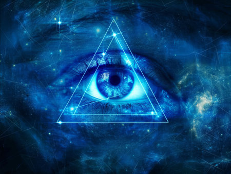 A close-up of a vivid blue eye within a glowing triangle, set against a cosmic background.の素材