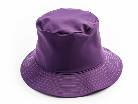A classic purple hat with ribbon detail, isolated on white background, perfect for fashion accessories.の素材
