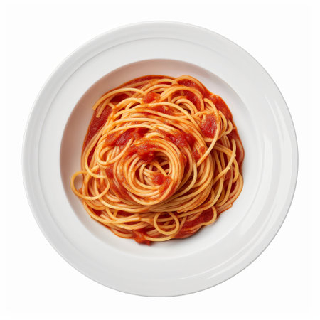 Top view of a classic dish, spaghetti in a rich tomato sauce, served on a white plate isolated on white background.の素材