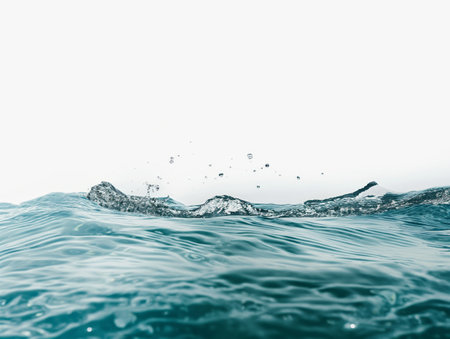 Dynamic image of ocean waves splashing with water droplets in the air, capturing the essence of natures power and beautyの素材
