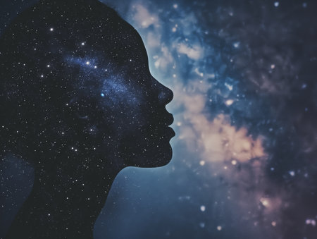 A silhouette of a persons profile filled with a starry night sky, symbolizing the connection between humanity and the universe. The image evokes a sense of wonder and introspectionの素材