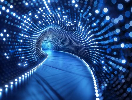 A winding tunnel illuminated by countless blue LED lights, creating a mesmerizing, futuristic ambianceの素材