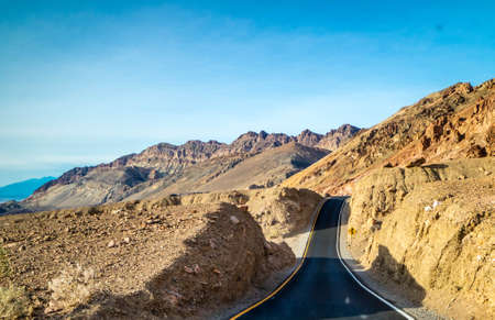 A long way down the road of Death Valley National Parkの写真素材