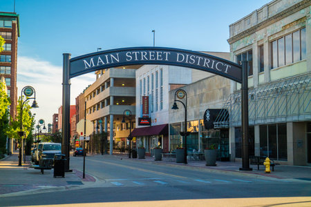 Rockford, IL, USA - June 4, 2017: A welcoming signboard of the Main Street District of the villageのeditorial素材