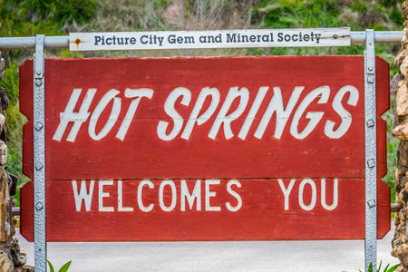 Hot Springs, SD, USA - May 5, 2019: A welcoming signboard at the entry point of unique attractions of the areaのeditorial素材