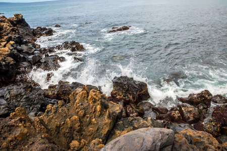A large refreshing flow of water with a peaceful view of the Honolua Bay