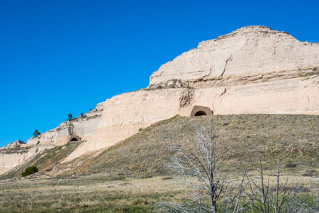 A natural rock formation of rugged badlands and towering bluffs