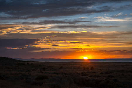 Dramatic vibrant sunset scenery in Antelope Island State Park, Utahの写真素材