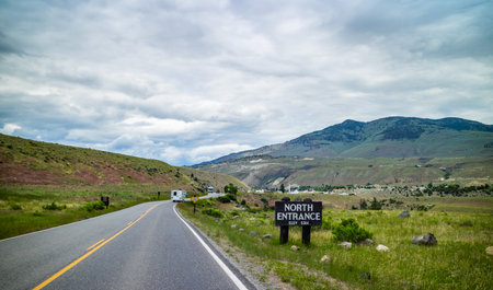 Yellowstone NP, WY, USA - June 23, 2019: A welcoming signboard at the entry point of the preserve parkのeditorial素材