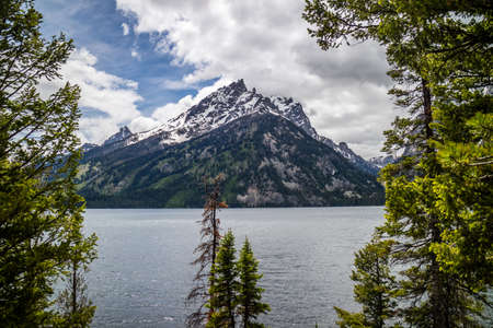 A long way down the road going to Grand Tetons NP, Wyomingの写真素材