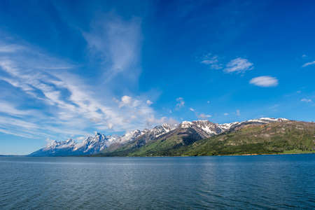 A long way down the road going to Grand Tetons NP, Wyomingの写真素材
