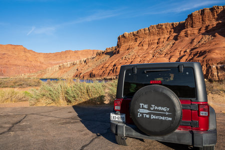 Glen Canyon NR, AZ, USA - Sept 25, 2020: A Jeep Wrangler Unlimited Sports parked along the preserve parkのeditorial素材