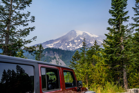 Mt Rainer NP, WA, USA - Aug 14, 2021: A Jeep Wrangler Unlimited Sports parked along the preserve parkのeditorial素材