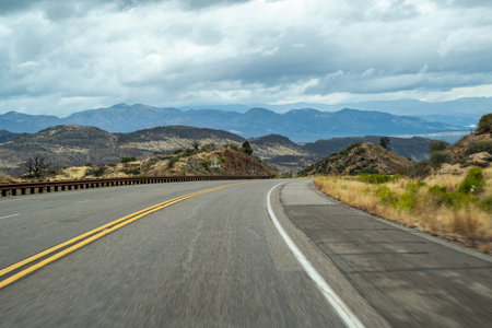 A long way down the road going to Tonto National Forest, Arizonaの写真素材