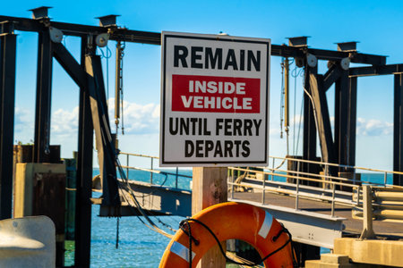 Ocracoke Island, NC, USA - Aug 13, 2022: A remain notice for visitorsのeditorial素材