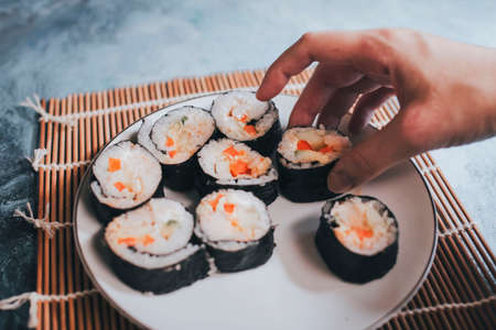 Delicious homemade sushi for everyone to enjoyの写真素材