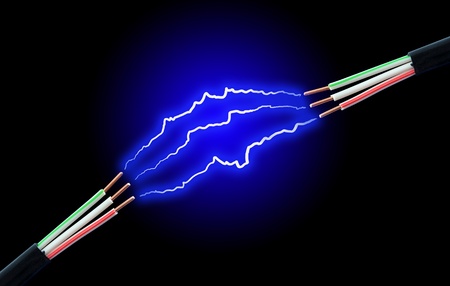 Electric cable with sparks on a black background.