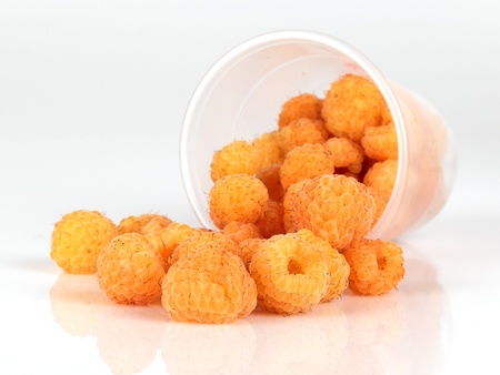 image yellow raspberries on white background