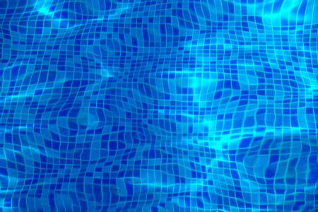 Pure blue water in the pool. Water background.の写真素材