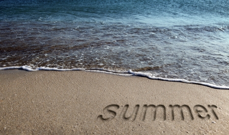 Inscription on the summer sand sea beach.の写真素材