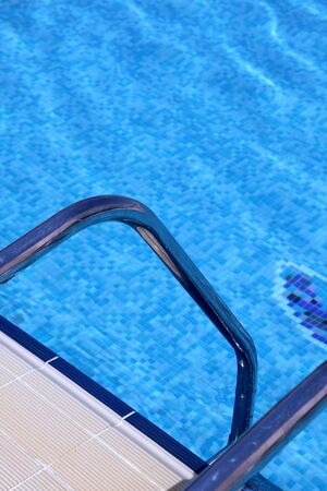 Pure blue water in the pool. Water background.の写真素材