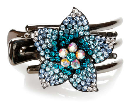 barrette with a flower with stones on white backgroundの写真素材