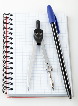 Metal dividers, pen and notebook の写真素材