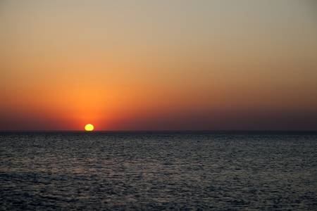 Sunset at Sea in the summer の写真素材