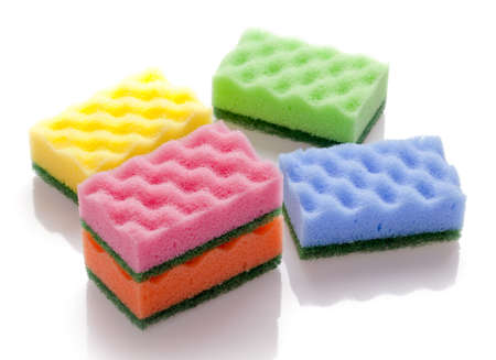 Kitchen sponge color isolated on white backgroundの写真素材