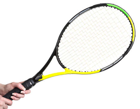 tennis racket in a female hand isolated on white backgroundの写真素材