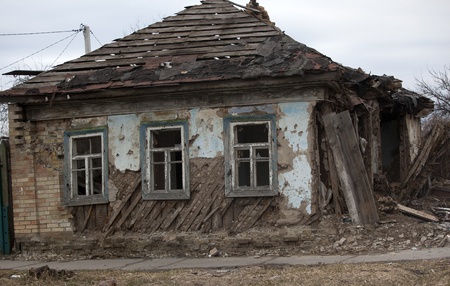 old abandoned wooden house on the streetの写真素材
