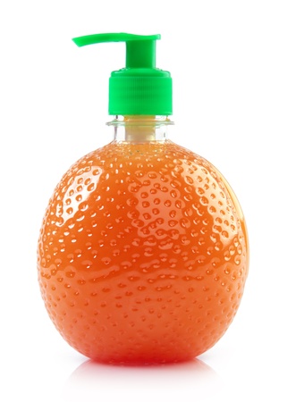 Plastic Bottle with liquid soap in the shape of an orange isolated on white background の写真素材