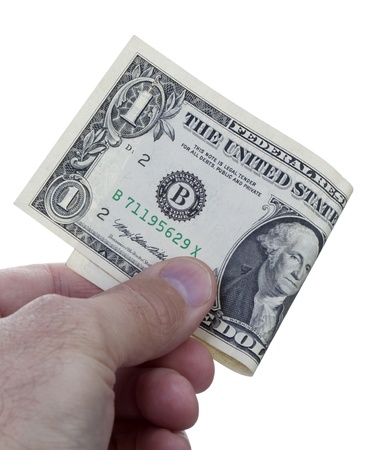 U.S. dollars in hand isolated on white backgroundの写真素材