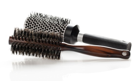 Professional round hairbrush isolated on white background
