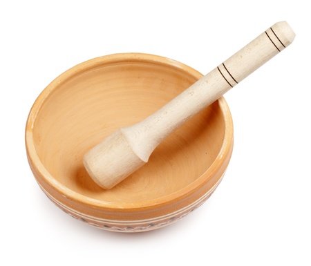 empty clay bowl with a wooden spoon isolated on white background の写真素材